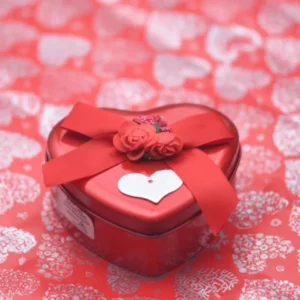 Elegant Heart-Shaped Red Chocolate Gift Box with Ribbon and Roses