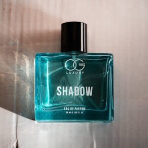 Luxurious perfume bottle with artistic shadows, shot in Bengaluru.